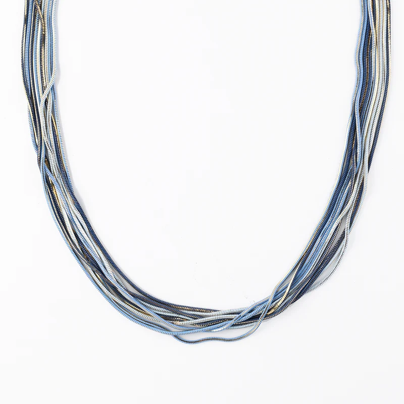 Collier multi chaînes bleu et doré