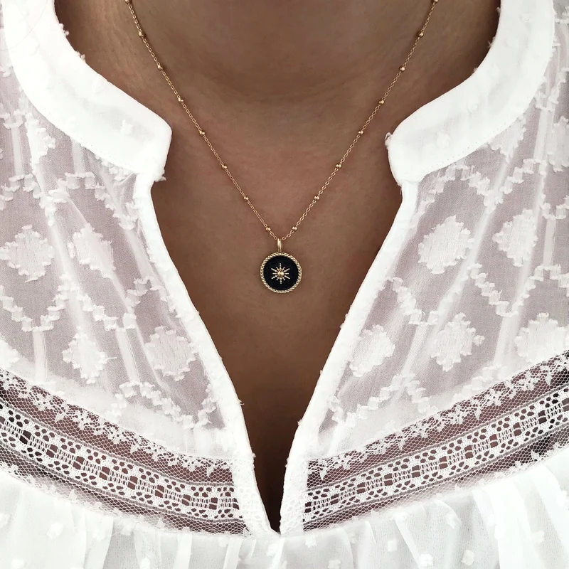 Collier "Soleil" noir plaqué or