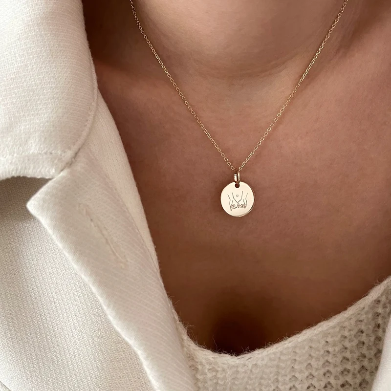 Collier "Main dans la main" plaqué or